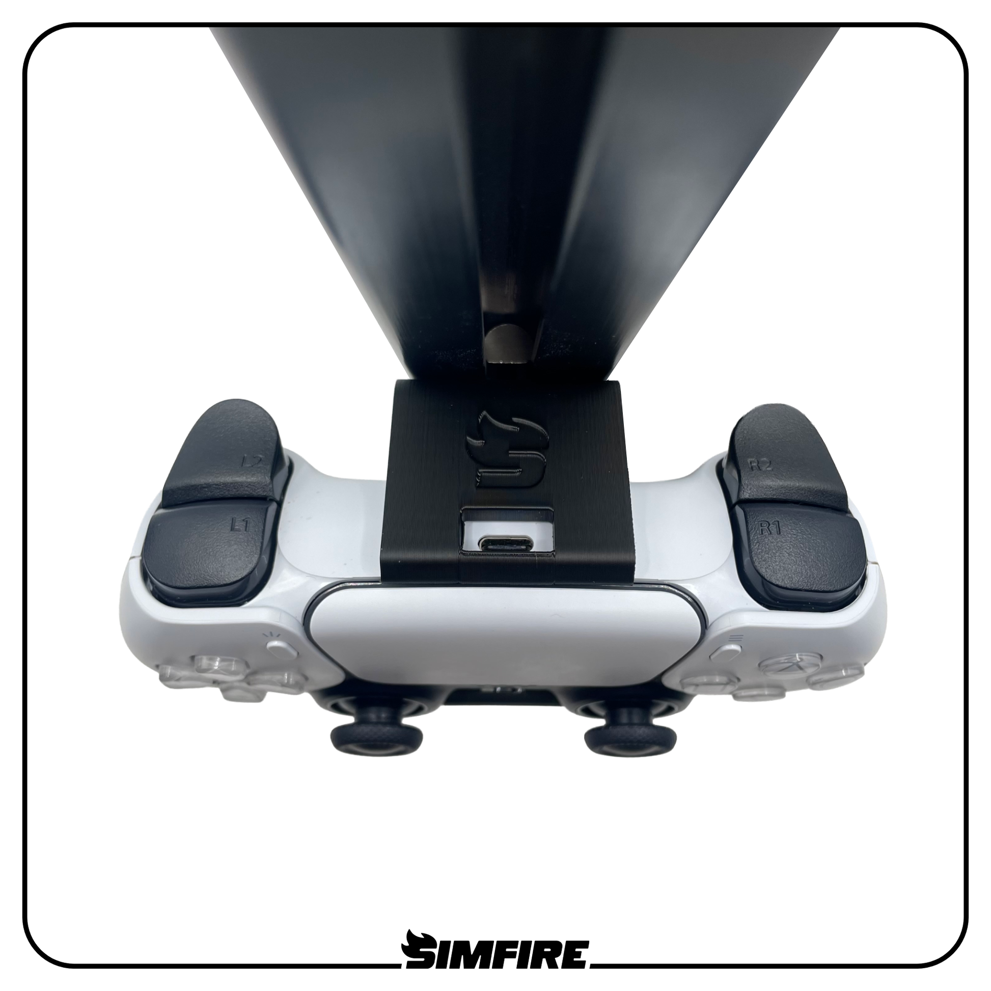 Top down view of sim racing rig PS5 controller mount showing charging port