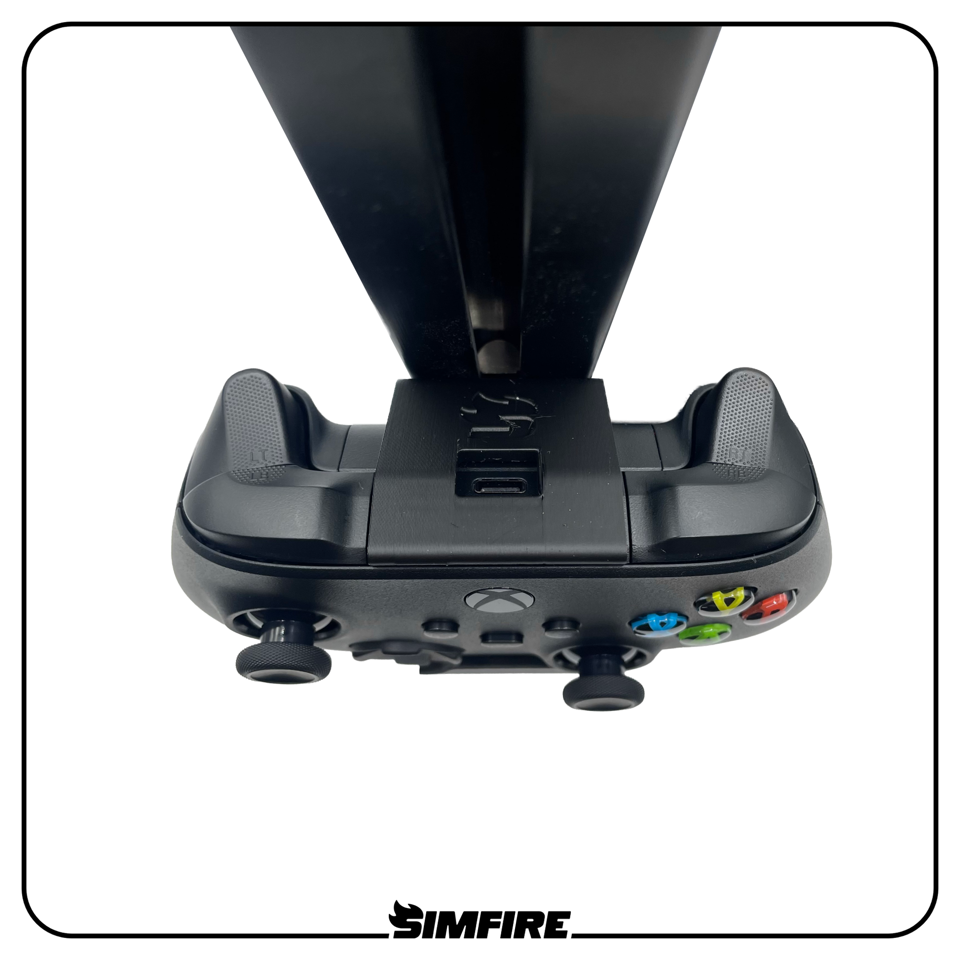Top down view of sim racing rig XBOX controller mount showing charging port